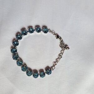 Crystal blue bracelet with silver colored band